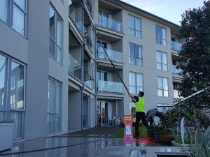 Cleaning windows at a mulit-story complex